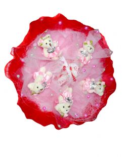 buchet din ursi rozi si bomboane